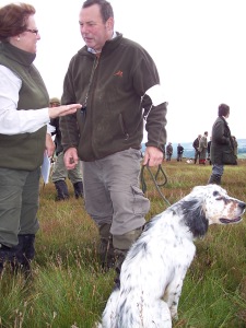 Dixie and I waiting for our run at the Yorkshire Gundog Club's Puppy Stake at Newbiggin Moor, Blanchland in July 2010 in the company of Mrs Val Isherwood.